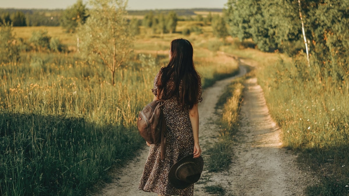 a girl walks in nature